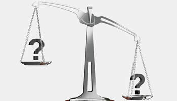 weighing scales unevenly balanced image