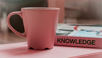 Knowledge book with mug image