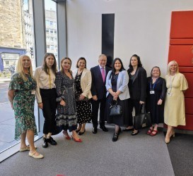 NES Chair David Garbutt, centre, and NES colleagues Clare McGuire (second from right) and Marion McPhillips (on the end, right) welcome the visiting delegation